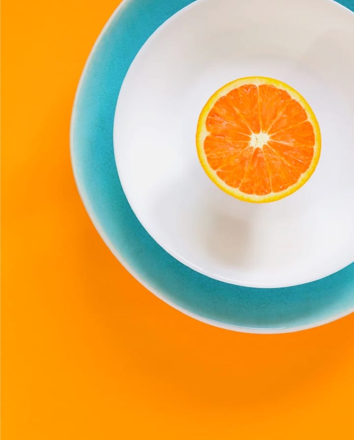 image of orange on a plate